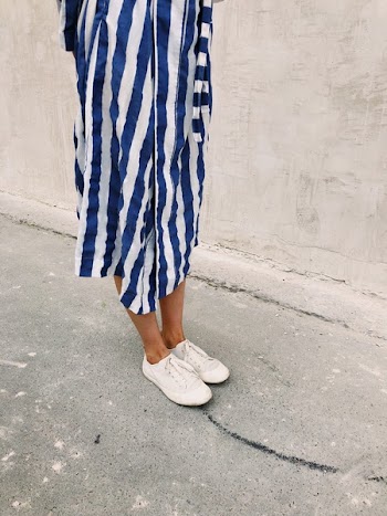 Woman Wearing White Plimsolls
