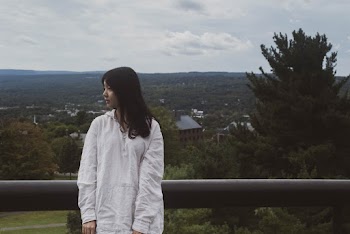 Woman Wearing White Pullover Hoodie