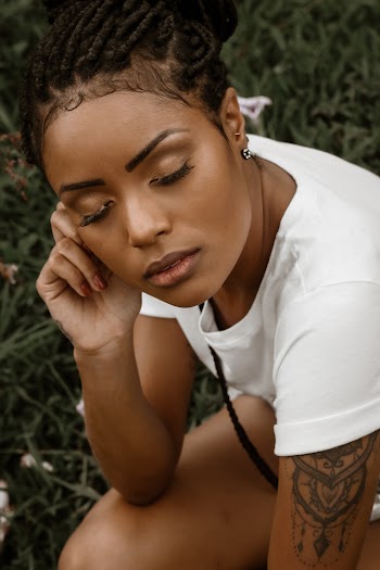 Woman Wearing White Scoop-neck Shirt