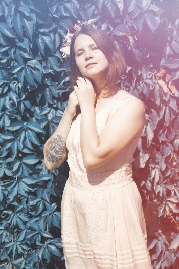 Woman Wearing White Sleeveless Dress