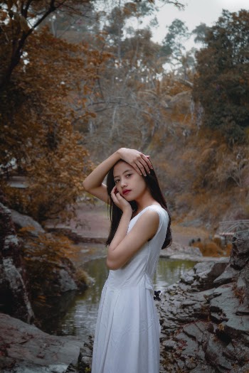 Woman Wearing White Sleeveless Dress