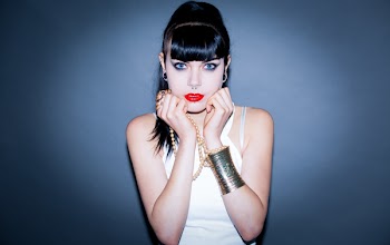 Woman Wearing White Sleeveless Top