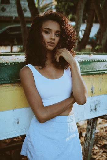 Woman Wearing White Sleeveless Top