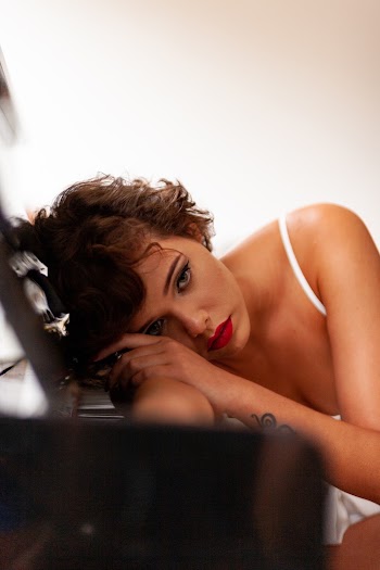 Woman Wearing White Spaghetti Strap Top Beside Piano
