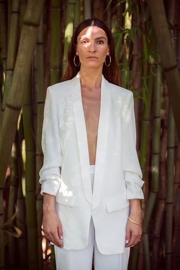 Woman Wearing White Suit Jacket and Pants
