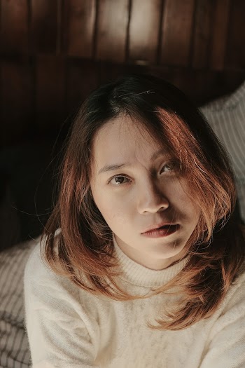 Woman Wearing White Sweater