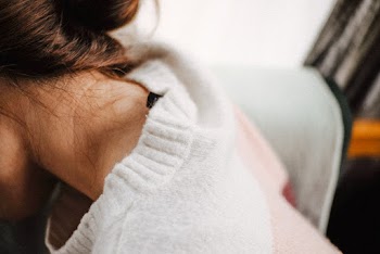 Woman Wearing White Sweater