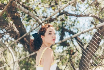 Woman Wearing White Top