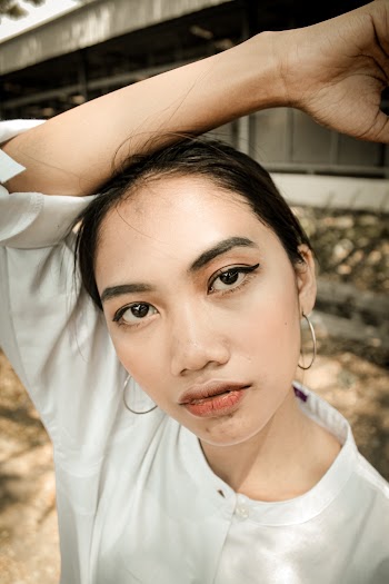 Woman Wearing White Top