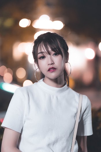 Woman Wearing White Top