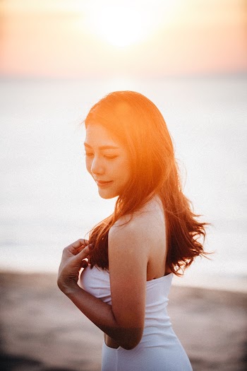 Woman Wearing White Tube Dress Near Sea
