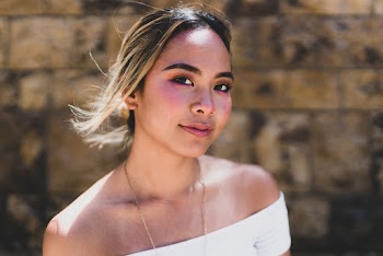 Woman Wearing White Tube Top Smiling
