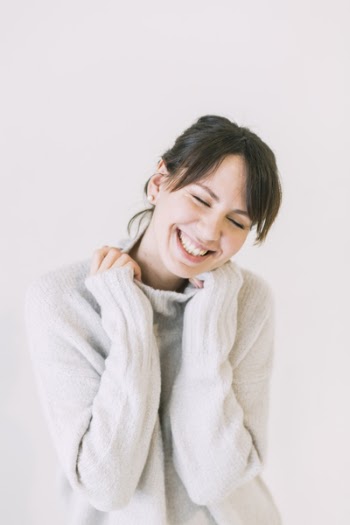 Woman Wearing White Turtle-neck Sweater
