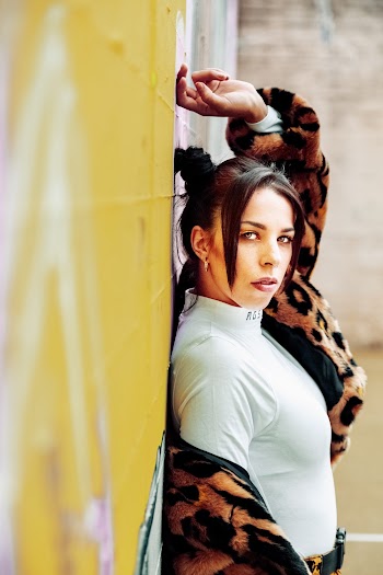 Woman Wearing White Turtleneck Top 