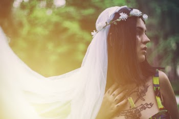 Woman Wearing White Veil Looking At Her Left Side