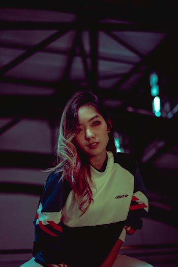 Woman Wearing WhiteAnd Blue Sweatshirt