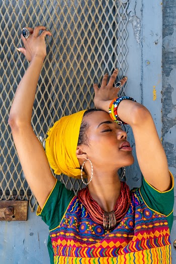Woman Wearing Yellow and Multicolored Short-sleeved Top