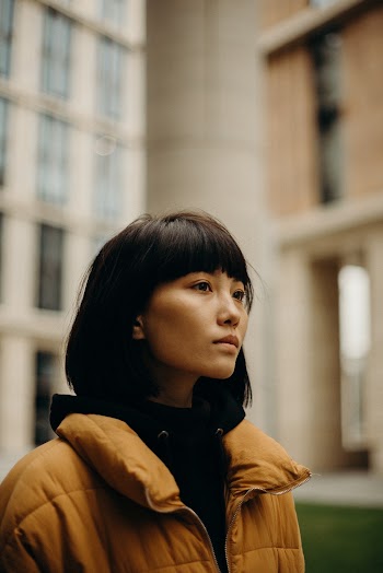 Woman Wearing Yellow Bubble Jacket
