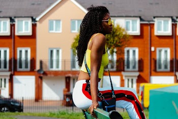 Woman Wearing Yellow Cami Crop-top