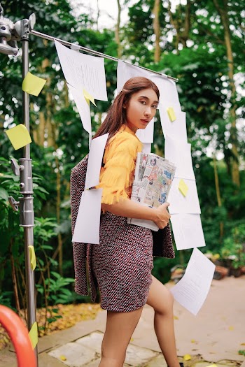 Woman Wearing Yellow Elbow-sleeved Shirt and Red Skirt