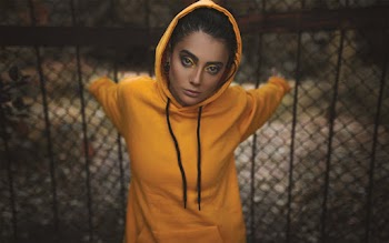 Woman Wearing Yellow Hooded Jacket