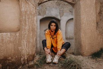 Woman Wearing Yellow Hoodie