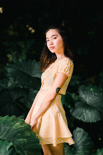 Woman Wearing Yellow Mini Dress