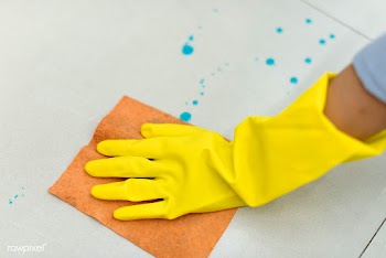 Woman wearing yellow rubber gloves and cleaning the surface | Free  photo - 2300059