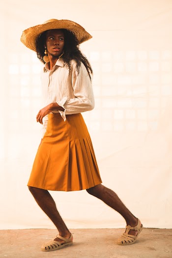 Woman Wearing Yellow Skirt and White Long-sleeved Top Photo