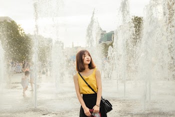 Woman Wearing Yellow Sleeveless Shirt