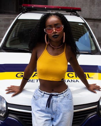 Woman Wearing Yellow Spaghetti Strap Top