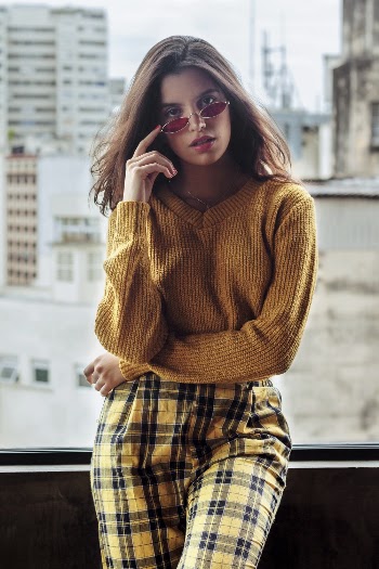 Woman Wearing Yellow Sweatshirt
