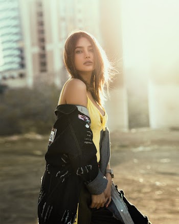 Woman Wearing Yellow Top and Black Denim Jacket