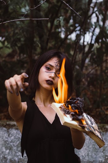Woman Wears Black Sleeveless Top
