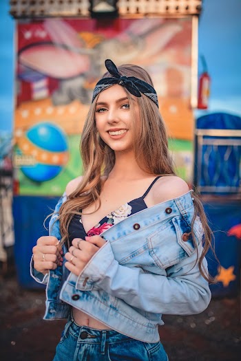 Woman Wears Blue Denim Button-up Jacket