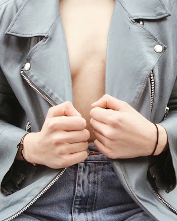 Woman Wears Gray Zip-up Jacket and Blue Denim Bottom