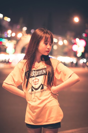 Woman Wears Orange Short-sleeved Shirt