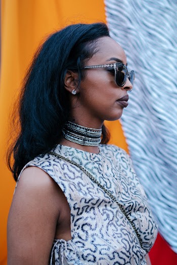 Woman Wears Sunglasses