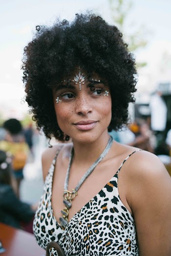 Woman Wears White and Black Leopard Print Camisole