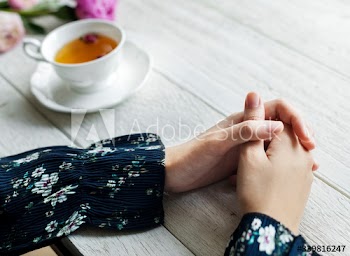 Woman with a hot cup of tea