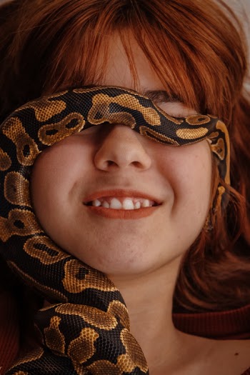 Woman With A Snake on Her Neck