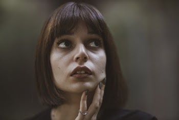 Woman With A Weary Facial Expression