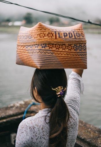Woman With Basket On Head