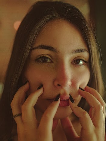Woman With Black Manicured Nails