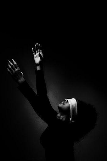 Woman With Blindfold Raising Her Two Hands