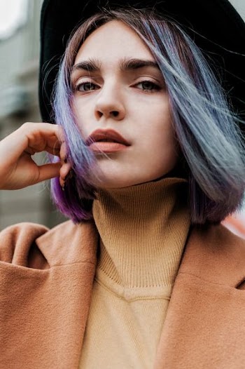 woman with blue and purple ombre hair dye