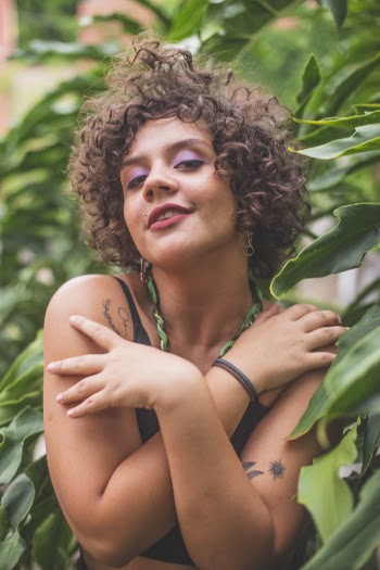 Woman With Both Hands On Shoulders