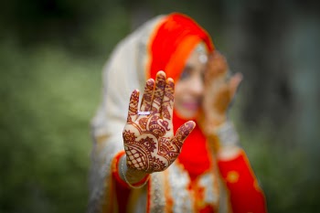 Woman With Brown Henna Tattoo