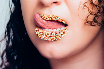 Woman With Candy Sprinkles on Lips
