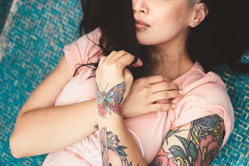 Woman With Cross-hands over Her Chest
